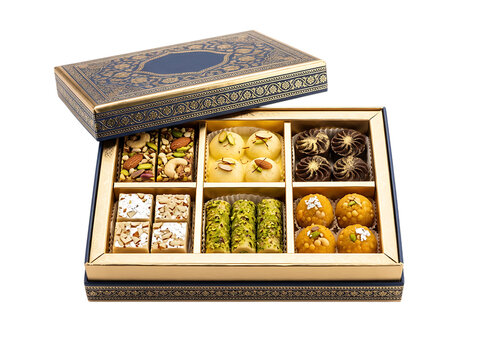Assorted indian sweets in a decorative blue gift box for diwali celebration