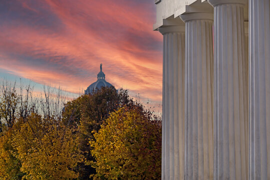Dramatic Sunset View of Naturhistorisches Museum Wien Dome Through Theseustempel Columns in Vienna