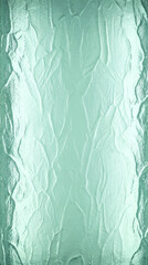 Textured light green translucent glass surface background