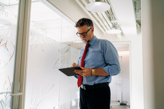 A man using a tablet in the office