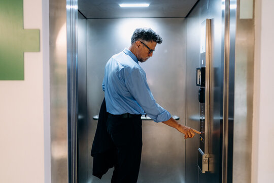 Businessman in the elevator