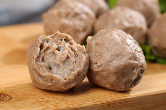 Handmade Chaoshan Beef Meatballs on Wooden Board - Traditional Chinese Gourmet Food Studio Photography