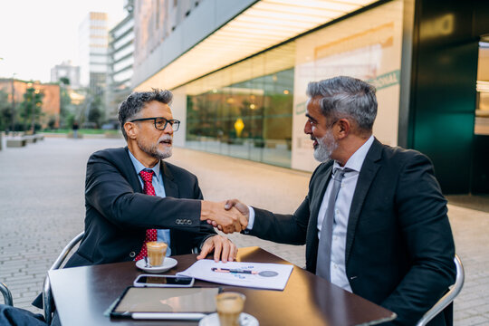 Businessmen shake hands