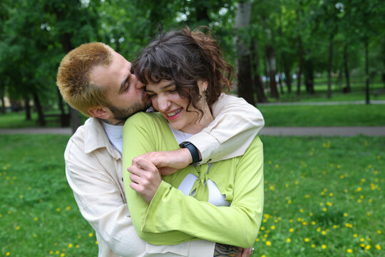 young couple walking in the park
