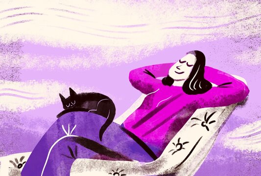 Relaxing Woman Resting on Sofa with Cat