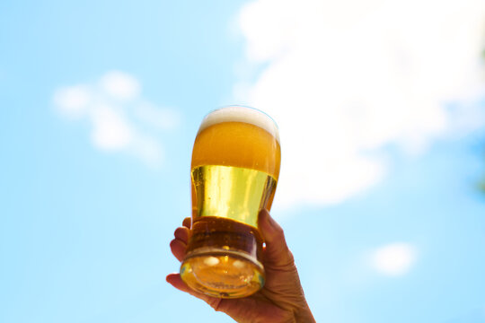 Glass of Beer Against the Sky 