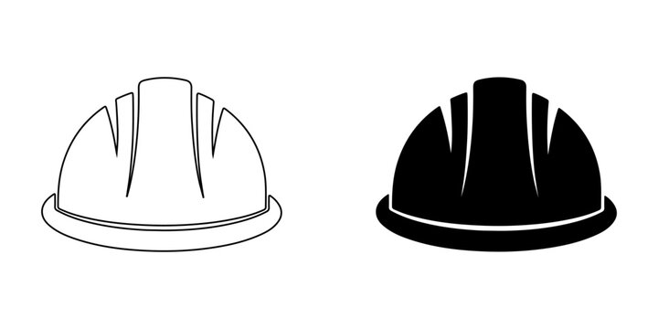Black and white hard hats for workplace safety compliance. Protective construction helmets ensuring worker security on job sites.