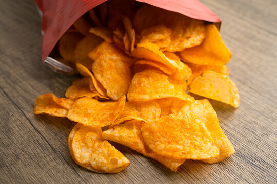 Potato chips , delicious BBQ seasoning spicy for crips, thin slice deep fried snack fast food.