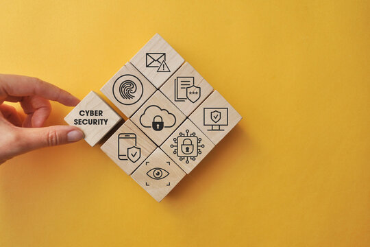 Hand Holding Cybersecurity Puzzle Concept