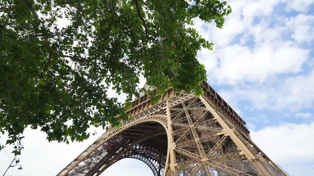 Dramatic summer reveal of the Eiffel Tower in Paris.