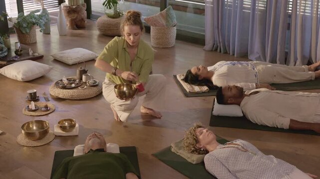 Sound healing session with tibetan bowl