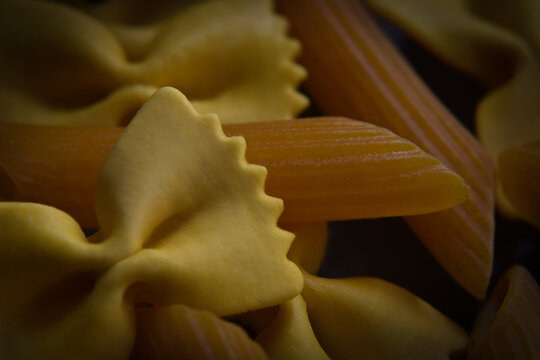 Closeup of Italian pasta farfalle and penne
