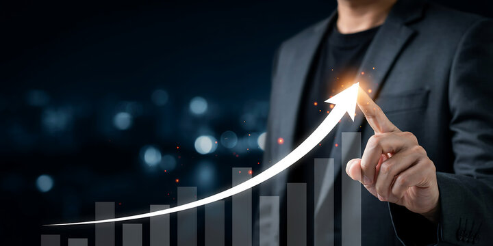Businessman pointing at rising financial chart to visualize market expansion and profit increase with business investment corporate management strategy analysis development marketing planning