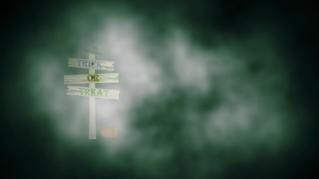 Trick or treat rickey old broken wooden signpost in foggy Halloween scene
