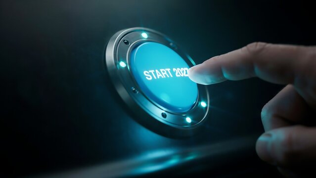Finger pressing futuristic start 2027 button glowing blue