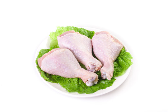 Fresh Raw Chicken Thighs with Bone on Plate - Tender Juicy Poultry Meat for Sale