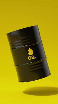 Single black metal oil barrel rotating on a yellow background for petroleum industry concept. Vertical video.