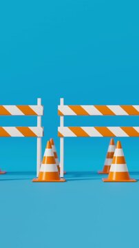 Front view traffic cones and safety barrier in orange on a blue background for road safety and construction warning. Vertical video.