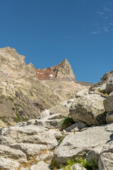 Fototapeta premium Guttannen, Switzerland. Rugged granite peaks and alpine boulders near Gelmersee in the Bernese Alps