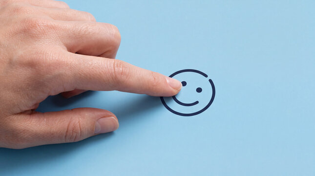A close-up shot shows a finger about to touch a simple smiley face icon on a blue background.