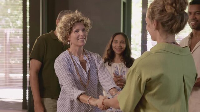 People hugging after a wellness retreat experience