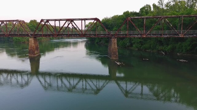 Drone View of Rails to Trails railroad bridge over the Broad River in South Carolina in early morning