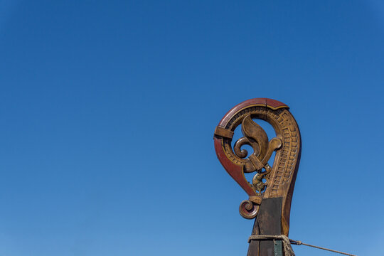 Viking ship prow featuring intricate wood carving in Oslo