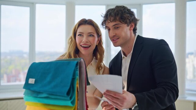 Designer presenting fabric samples to client. Woman choosing textile office.
