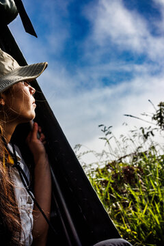 Girl looking out over Galapagos volcano