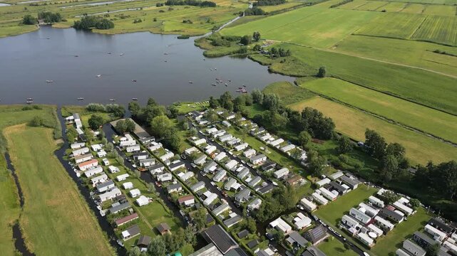 Aerial view of giethoorn village landscape with canal and lake. 