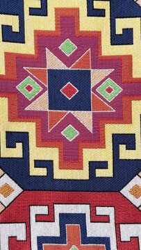 Colorful geometric star textile pattern with ethnic woven ornament