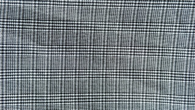 Grey plaid fabric with classic woven textile check pattern