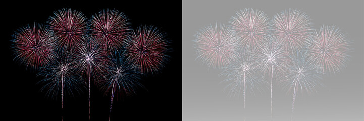 Fototapeta premium Bright multicolored fireworks display creating festive glowing explosions in the dark night sky