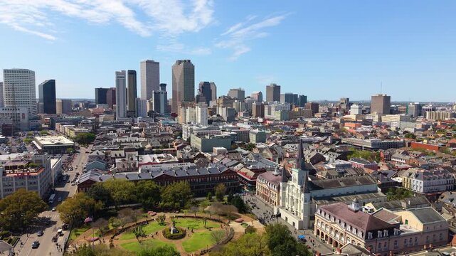 Aerial cityscape of Jackson Square in New Orleans, Louisiana with St. Louis Cathedral, modern buildings and urban neighborhoods. One of the most recognizable skylines in American South.