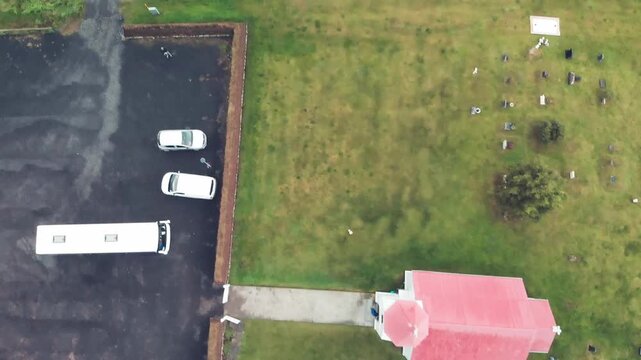 Panoramic drone view of Glaumbaer Museum and red church.