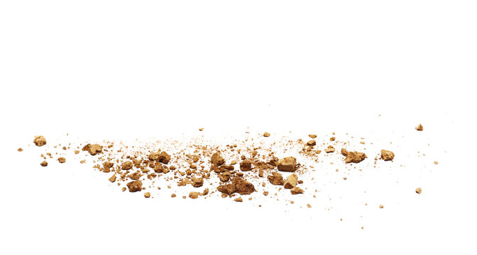 Scattered clods of dirt, soil isolated on white background, side view, with clipping path