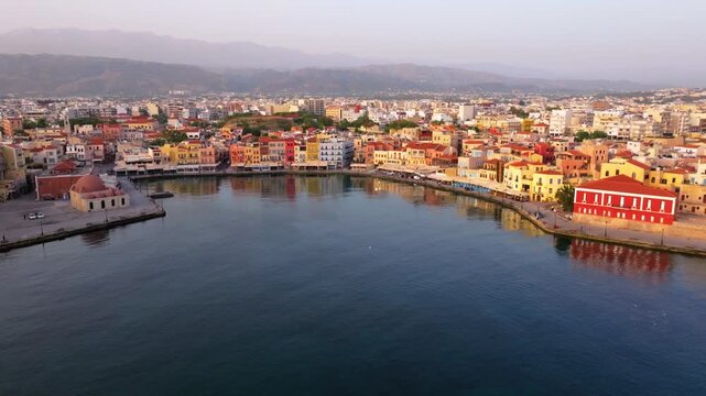 Beautiful Old city, Greece and best scenic places - panorama of picturesque old town Chania. Crete island, Panoramic of the old Venetian port and lighthouse during the blue hour, Travel Concepts