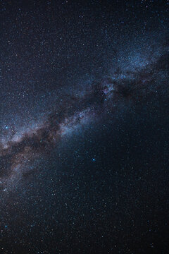 Colorful bright Milky Way galaxy on the starry sky.