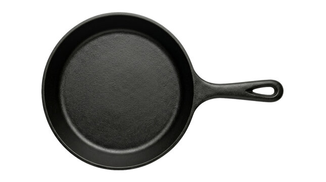 Cast iron skillet top view on white background: cooking essentials