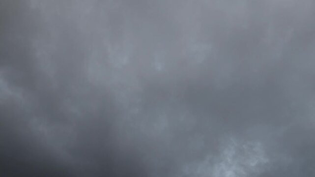 Dark clous leaving and blue clouds enters at sunset