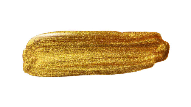 Gold metallic paint brush stroke isolated on white background