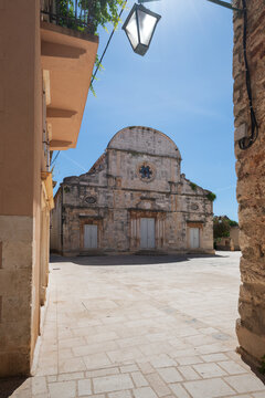 Saint Stephen church facade on a sunny historic square in Stari Grad