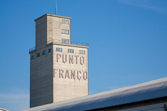 Punto Franco bonded warehouse concrete tower under clear blue sky in Chiasso, Switzerland