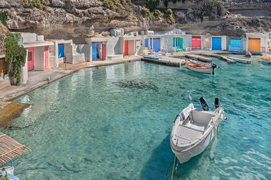 Picturesque fishing village of Mandrakia on Milos Island, Greece.
Colorful boathouses on a turquoise coastal harbor in the Cyclades group of islands.