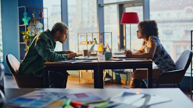 Man and woman arguing office desk. Business coworkers stressed work conflict.