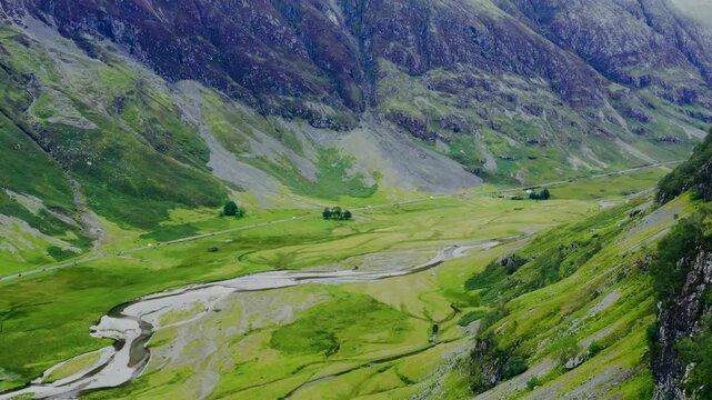 Aerial Drone Shot of Road Through the Glen Coe Hills 06