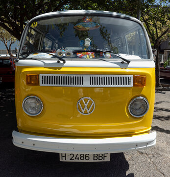 TAVERNES BLANQUES, SPAIN - JUNE 14, 2026.Classic Volkswagen Transporter camper van with tropical decor at vintage car festival in Spain