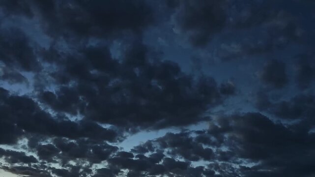 Wonderful landscape of darker blue cirrocumulus at dusk