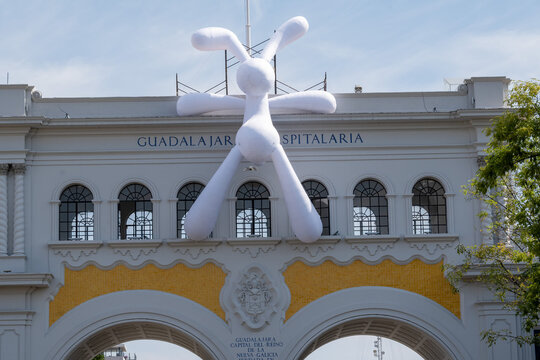 Guadalajara, Mexico - February 1 2026: White inflatable art on historic Guadalajara Arches. This sculpture for Art Weekend GDL blends modern with classic architecture.