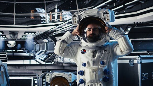 A portrait shows a joyful cosmonaut putting on a helmet before mission launch; the upbeat astronaut follows the orbital trajectory while preparing for deep space exploration and human expansion.